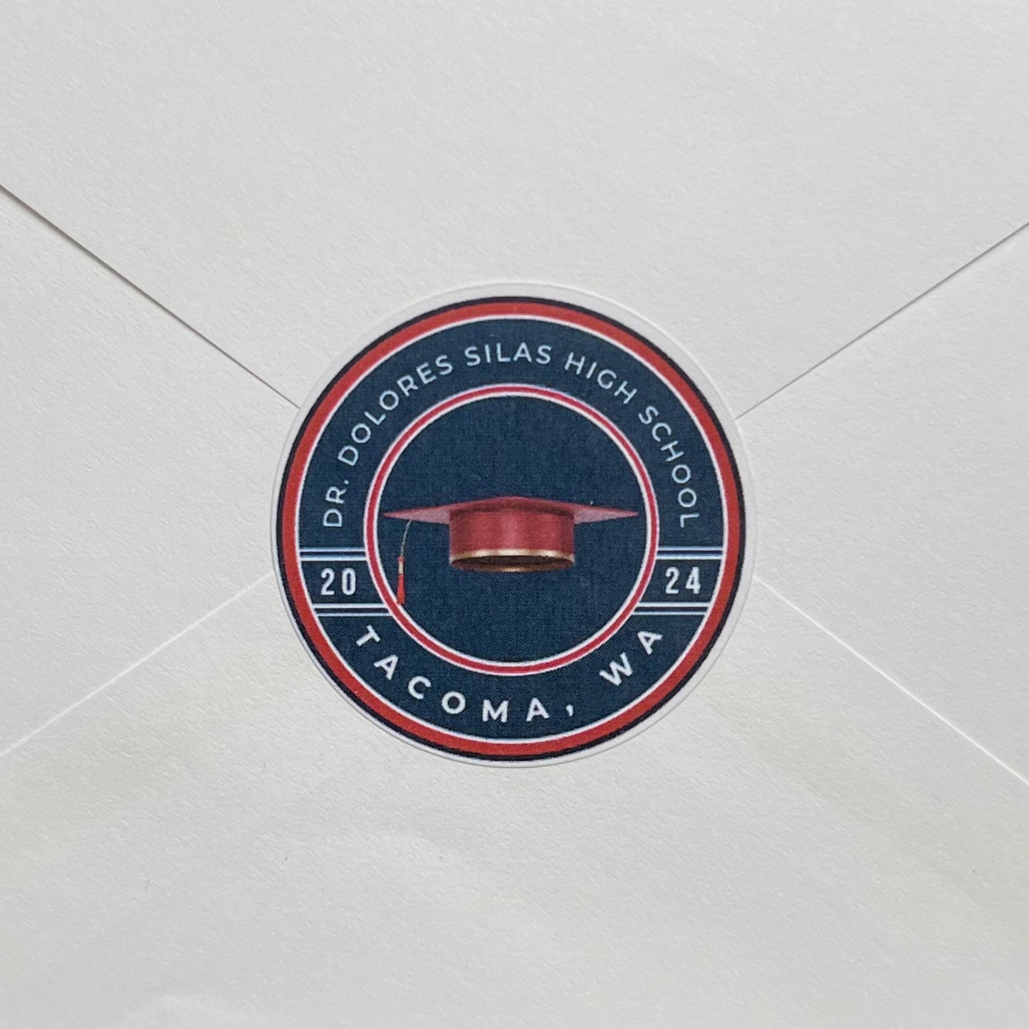 Inner envelope seal with school name, location and graduation year in official school colors.